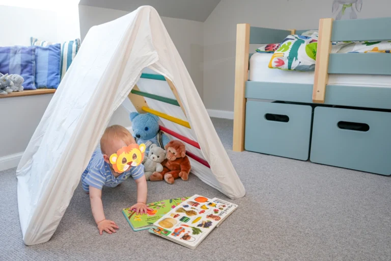 Climbing Triangle turned into a Den with a Bed Sheet