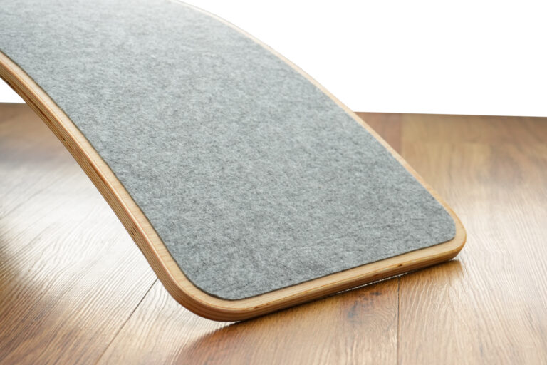 Felt on the underside of the balance board. This reduces noise and protects your floors from damage.